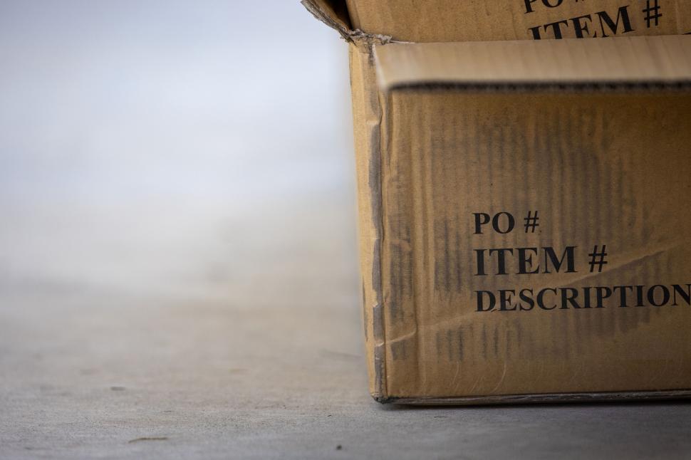 Free Image of Text-labeled cardboard box up close 