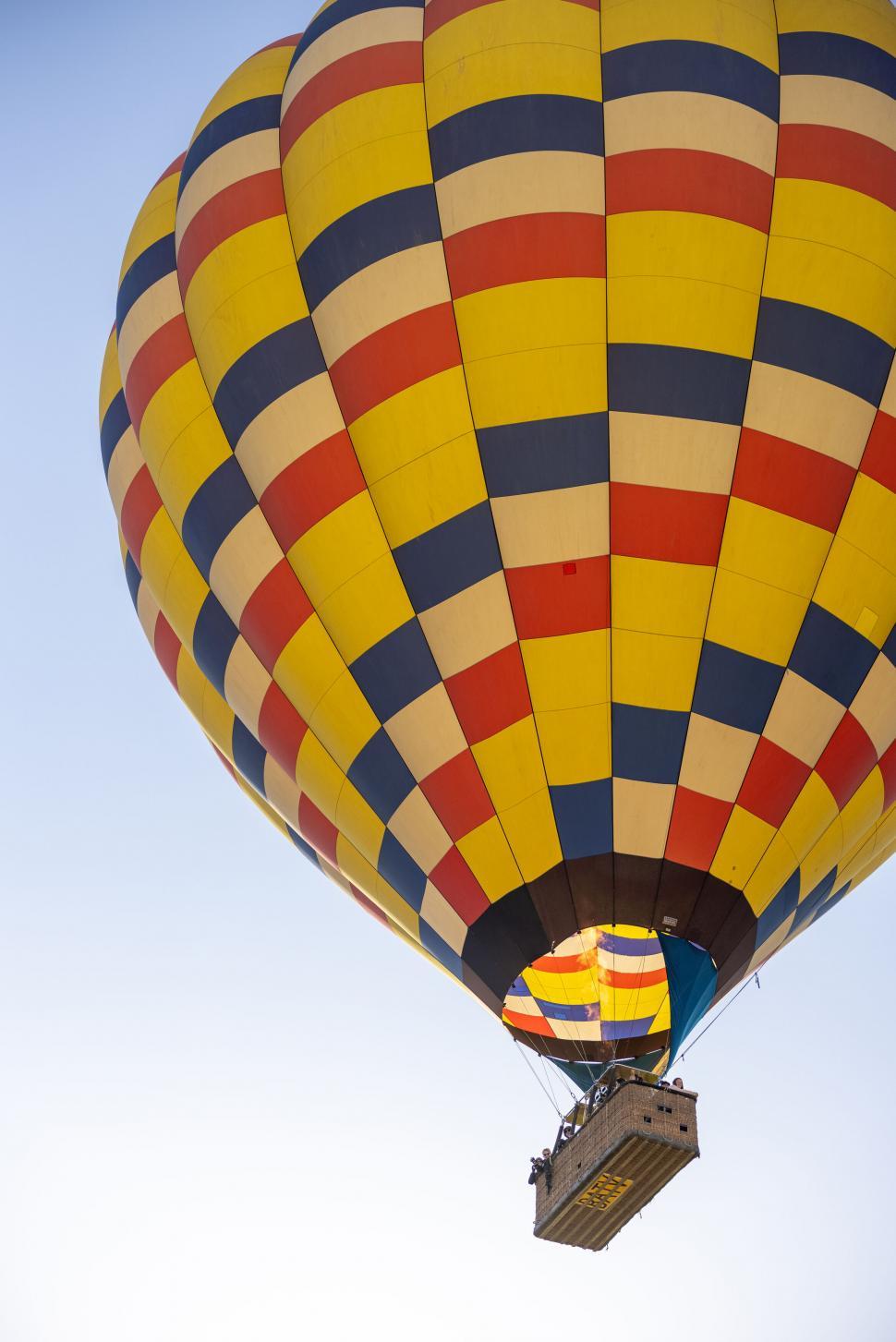 Free Image of Colorful hot air balloon against blue sky 
