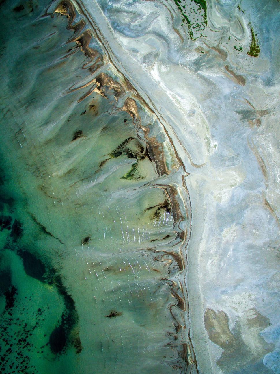Free Image of Tidal patterns on a sandy bay 