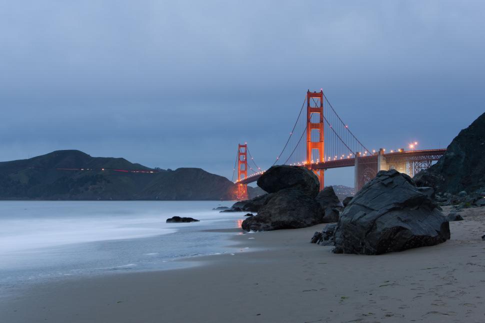 Free Image of Dusk view of Golden Gate Bridge from beach 