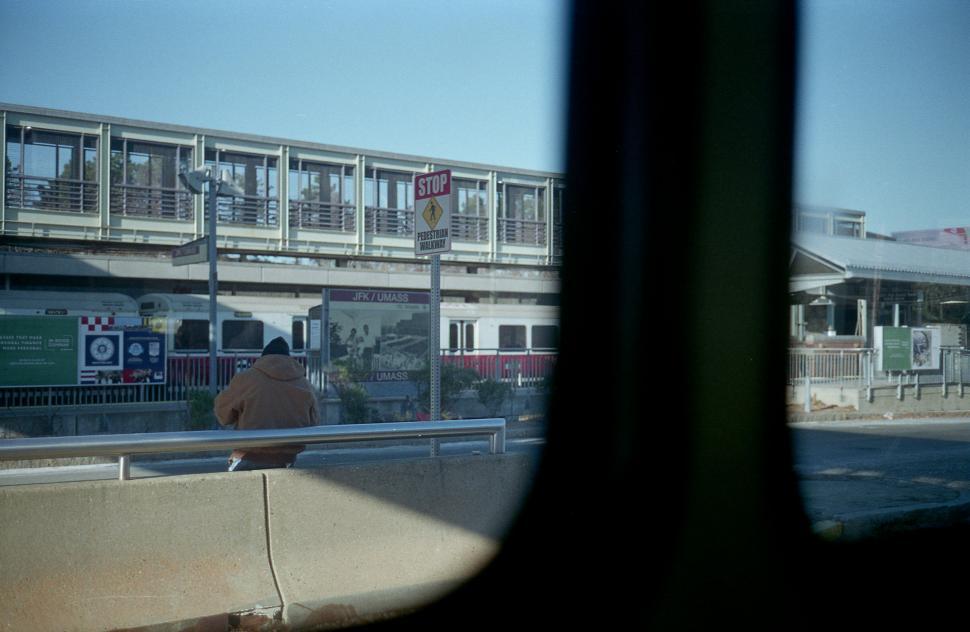 Free Image of Urban train platform scene with a lone traveler 