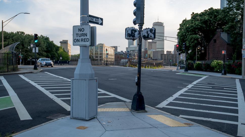 Free Image of Crosswalk sign and traffic lights at intersection 
