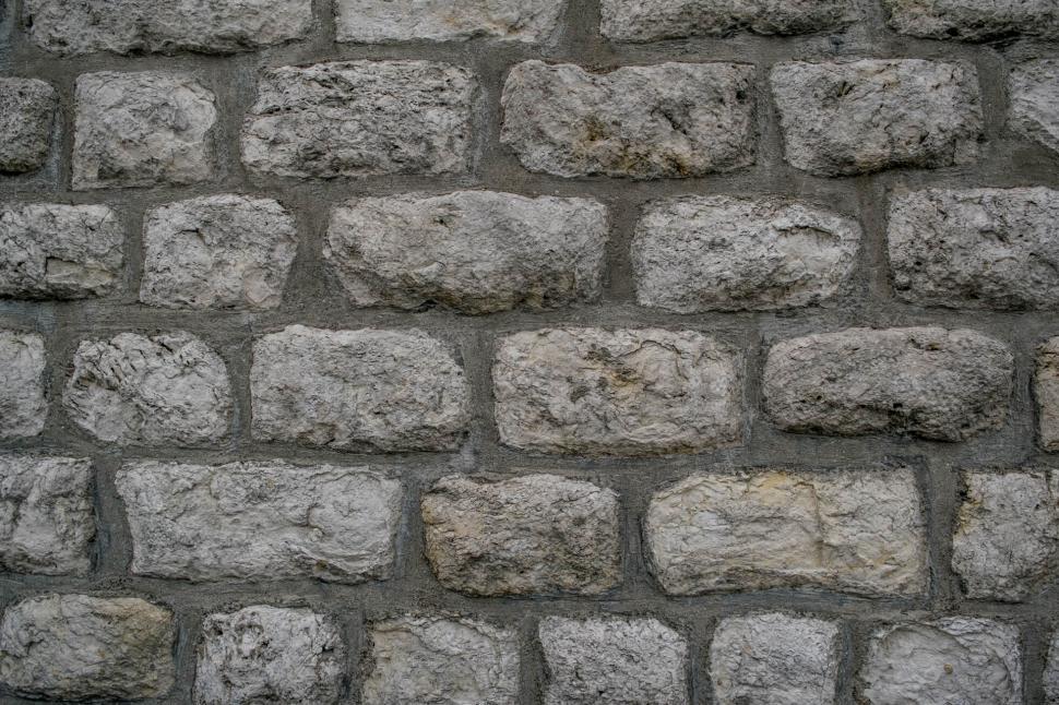 Free Image of Close-up of a textured stone wall 