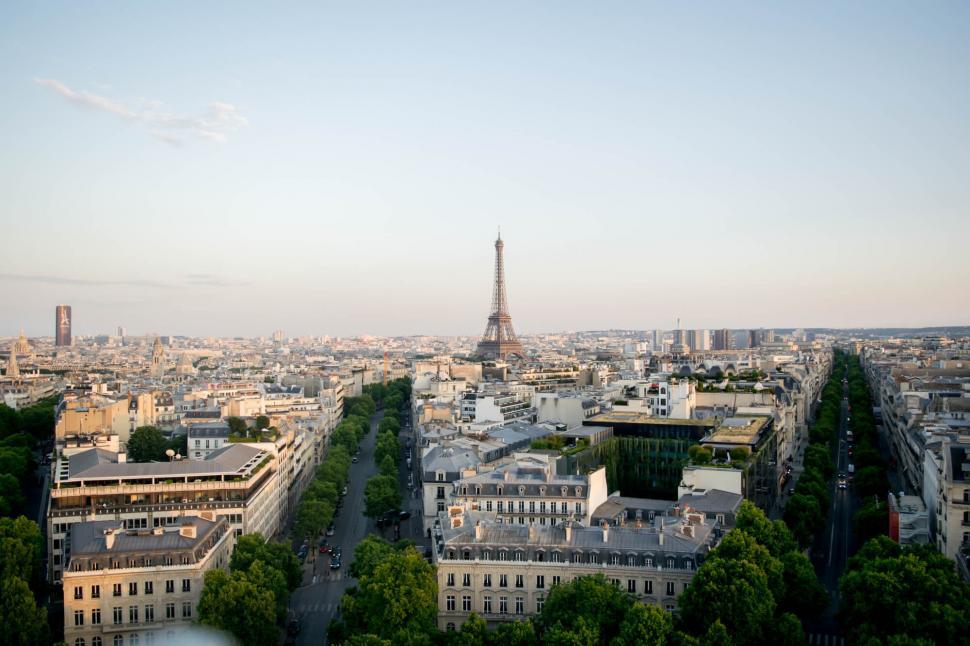 Free Image of Eiffel Tower seen from afar in the Paris skyline 