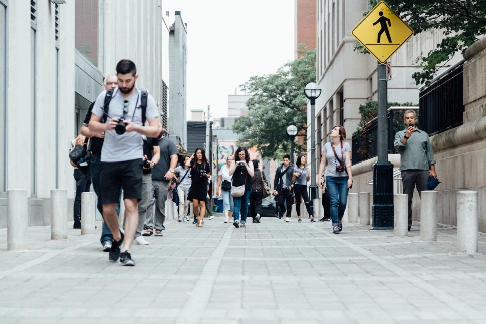Free Image of Busy city sidewalk with pedestrians 