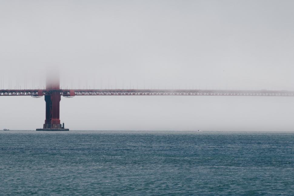 Free Image of Golden Gate Bridge enveloped in foggy mist 