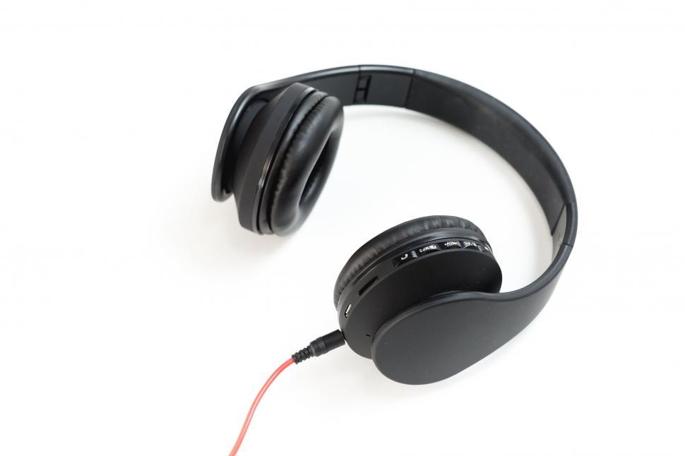 Free Image of Black headphones with red cable isolated 