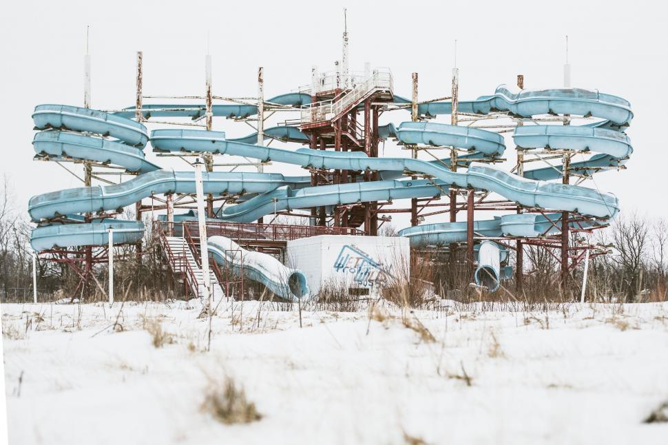 Free Image of Abandoned water park in snowy field 