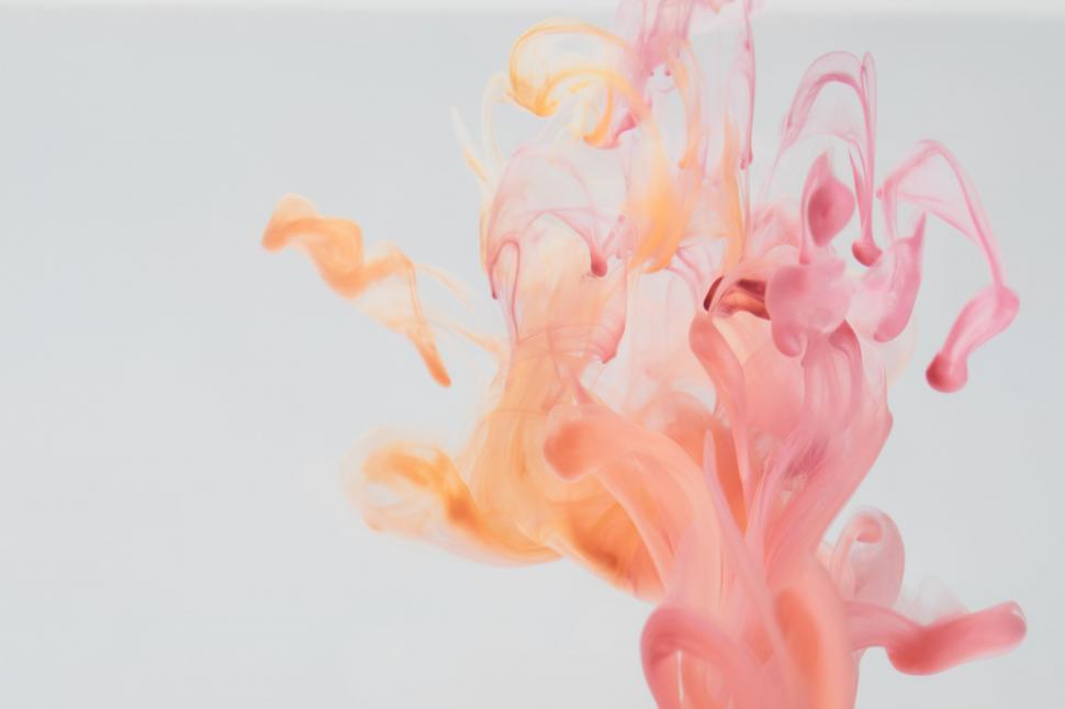 Free Image of Abstract pink and orange smoke on white 