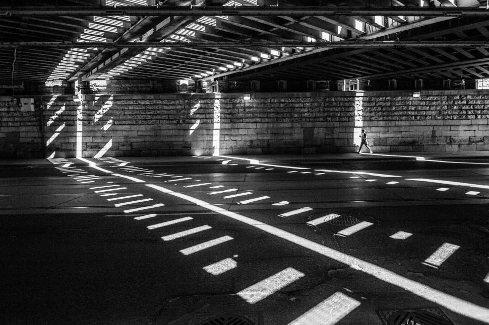 Free Image of Underpass with dynamic shadows and figure 
