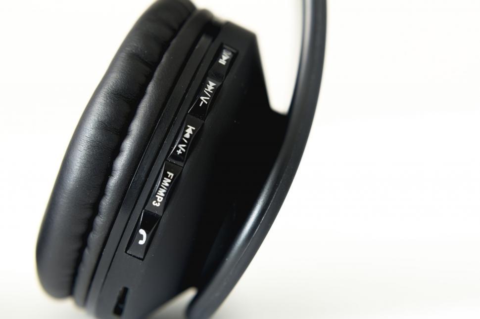 Free Image of Close-up of black wireless headphones 