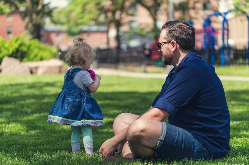 Free Image of Father and daughter enjoying a park day 