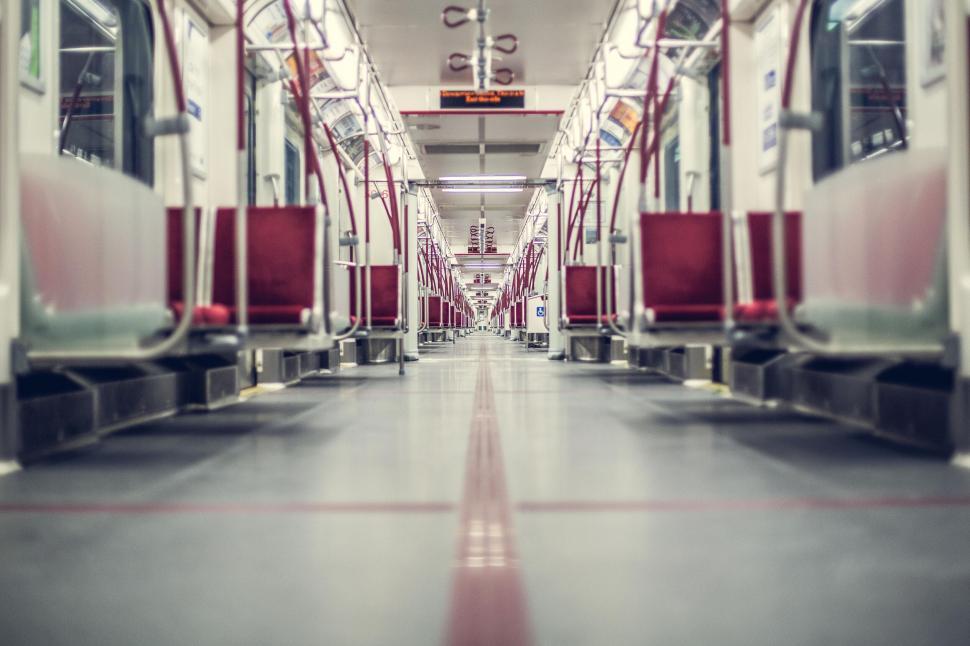 Free Image of Empty subway train interior in symmetrical view 