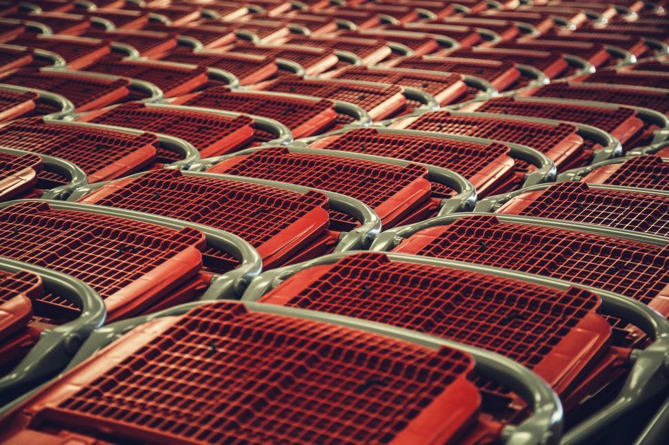 Free Image of Pattern of red shopping carts in repetition 
