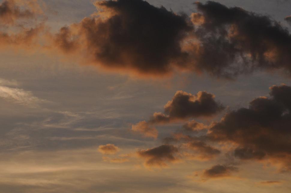 Free Image of Sunset lit clouds 