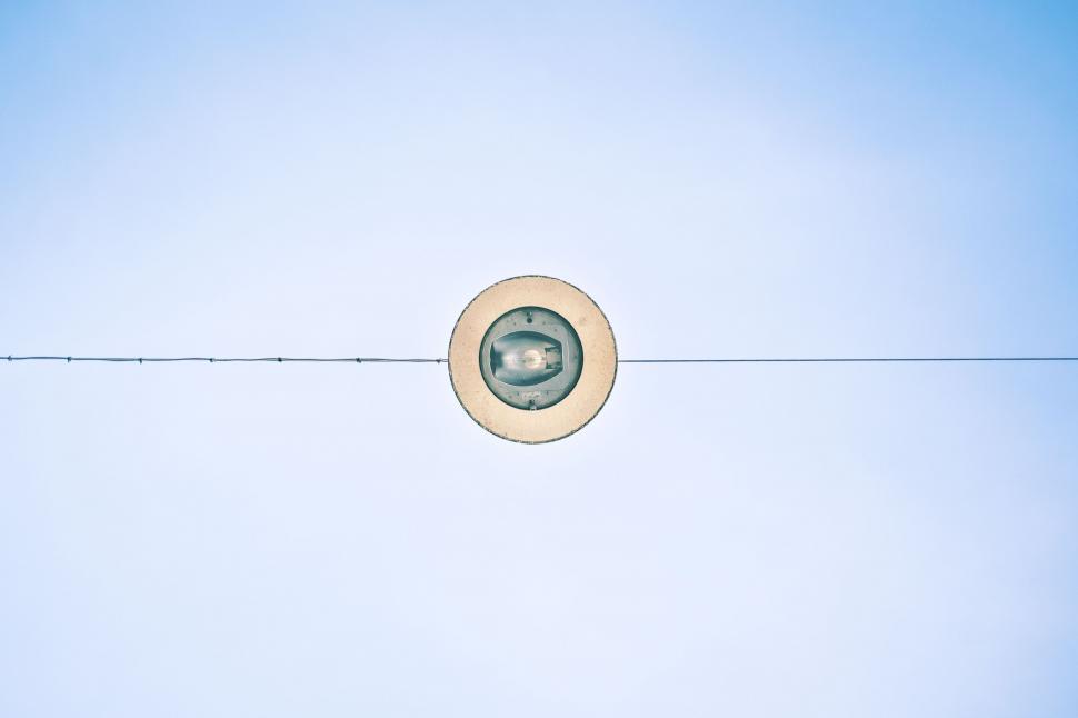 Free Image of Street lamp against a clear blue sky 
