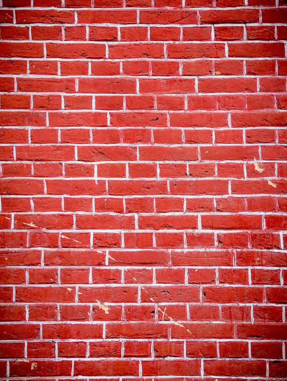 Free Image of Brick wall texture in vibrant red 