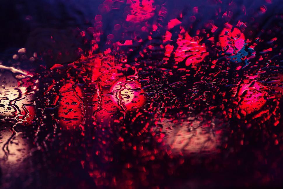 Free Image of Abstract colorful reflections on wet surface 