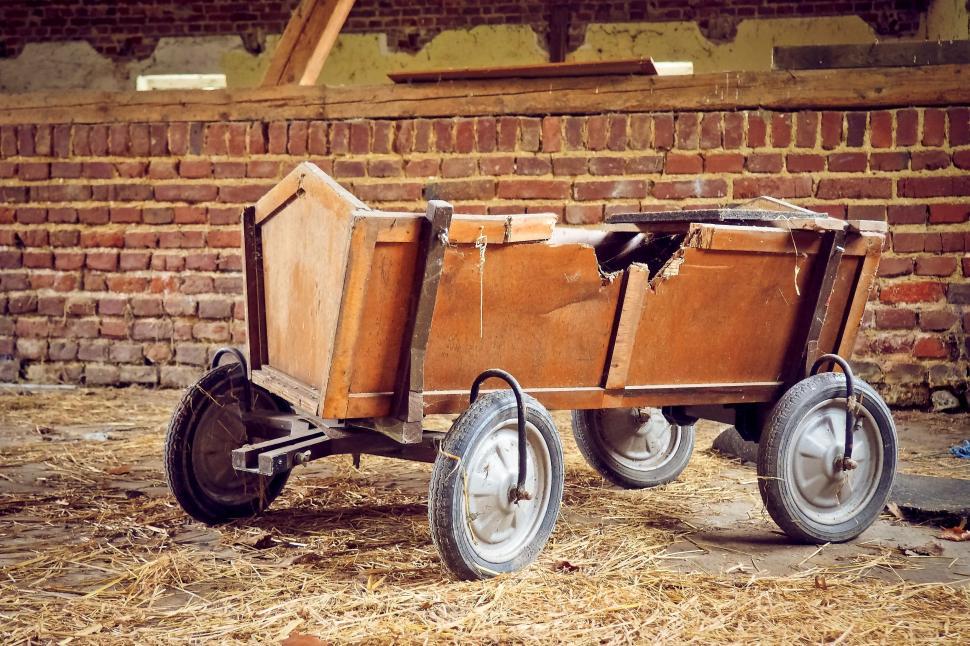 Free Image of Vintage wooden farm cart in barn 