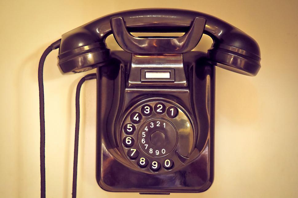 Free Image of Vintage black rotary telephone on desk 