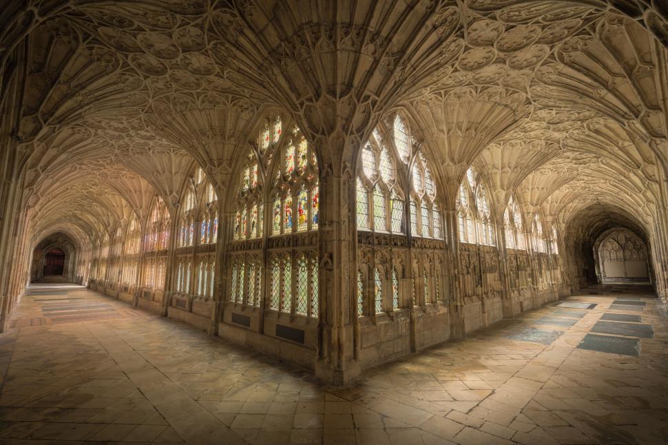 Free Image of Majestic medieval cloisters with intricate ceiling 