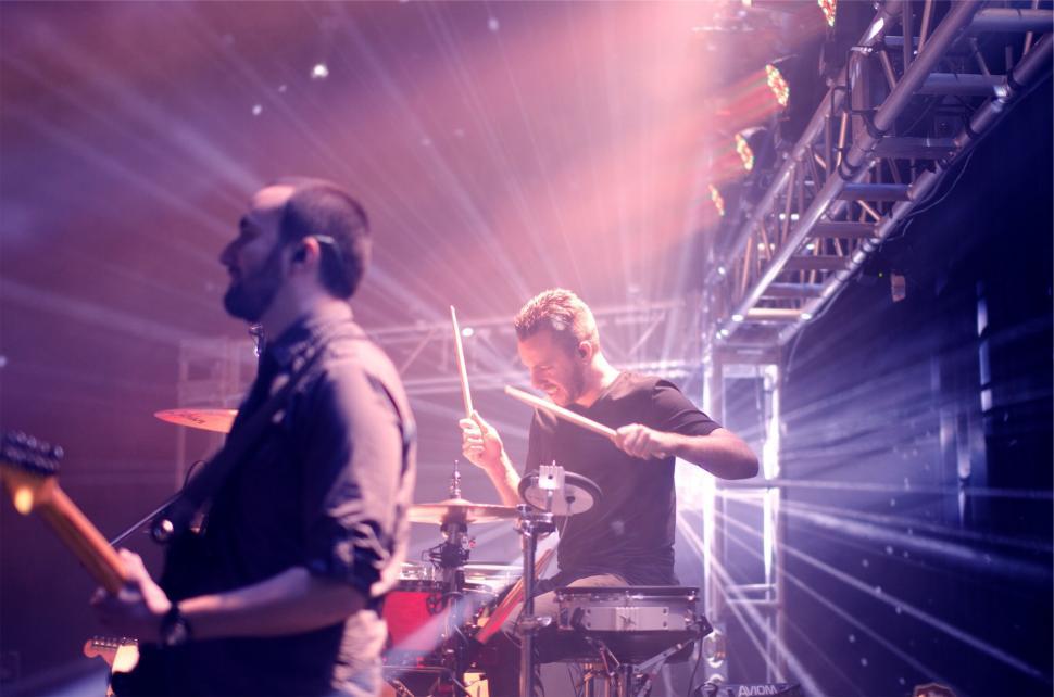 Free Image of Concert Scene with Dynamic Stage Lights 