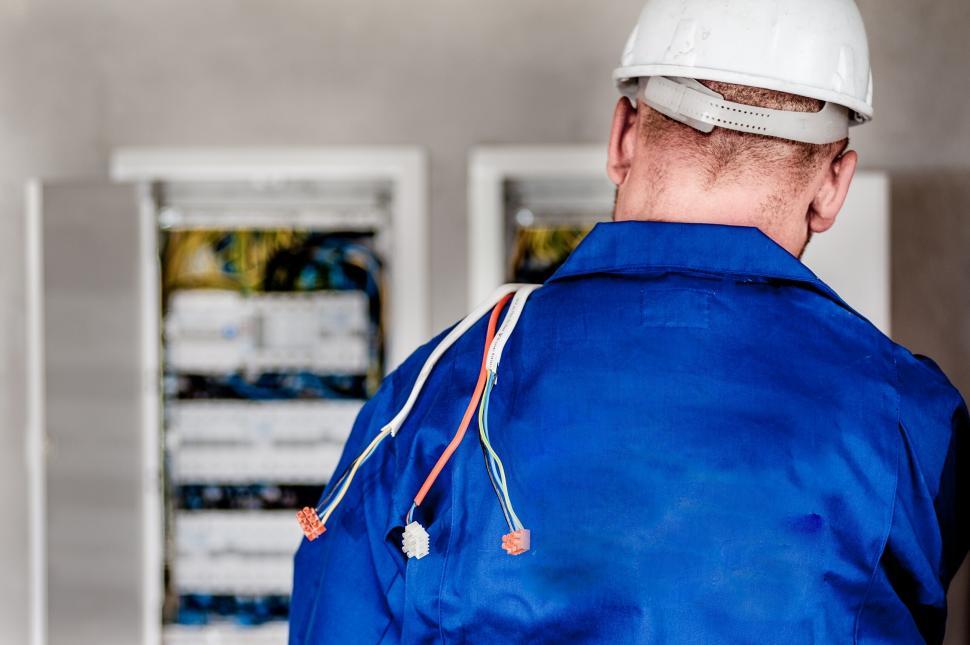 Free Image of Electrician working on electrical panel 