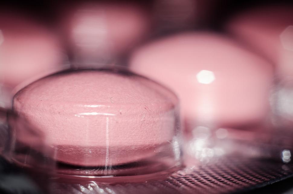 Free Image of Close-up of pink pills in blister pack 
