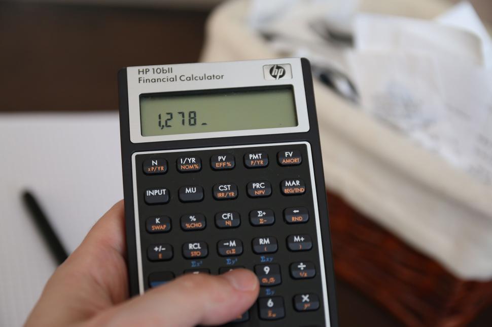 Free Image of Financial calculator in hand displaying numbers 