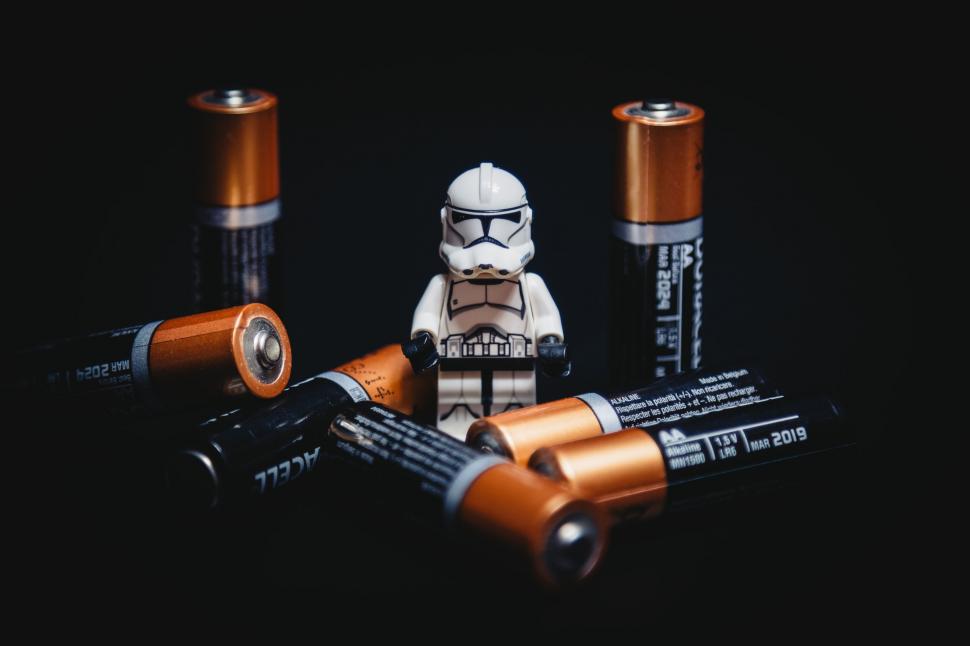 Free Image of Stormtrooper figurine among batteries 