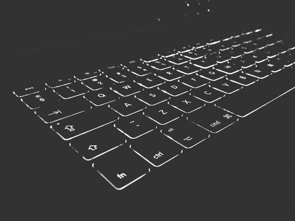Free Image of Black and White Image of a Backlit Keyboard 