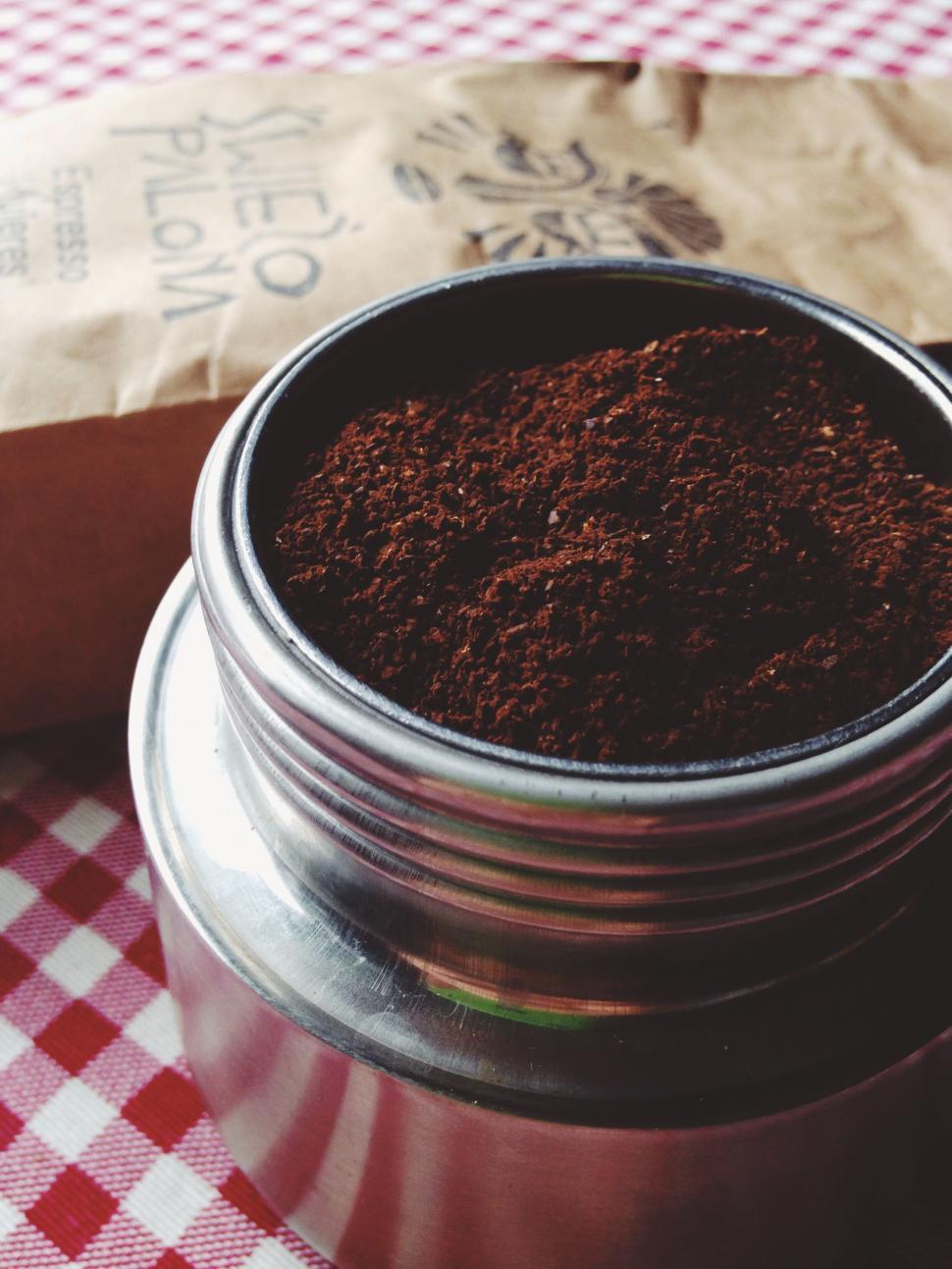 Free Image of Ground coffee in tin, close-up shot 