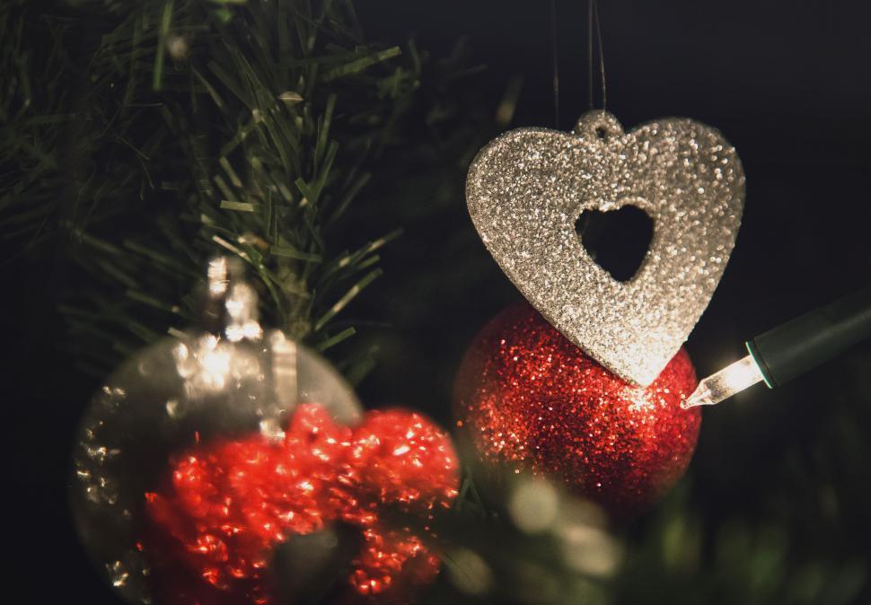Free Image of Christmas ornaments on a festive tree 