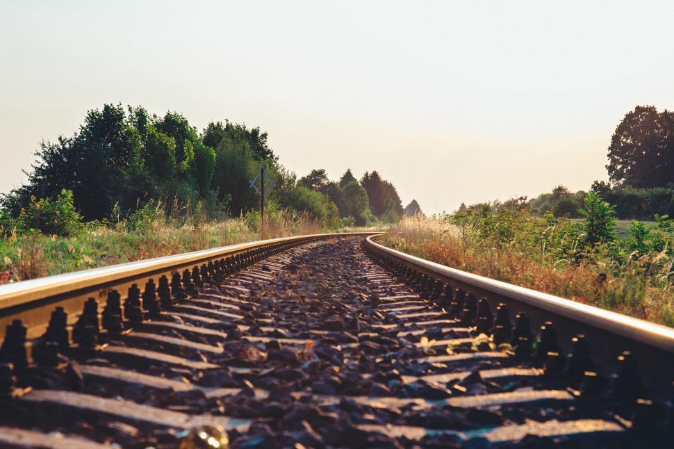 Free Image of Rural railroad track leading into distance 