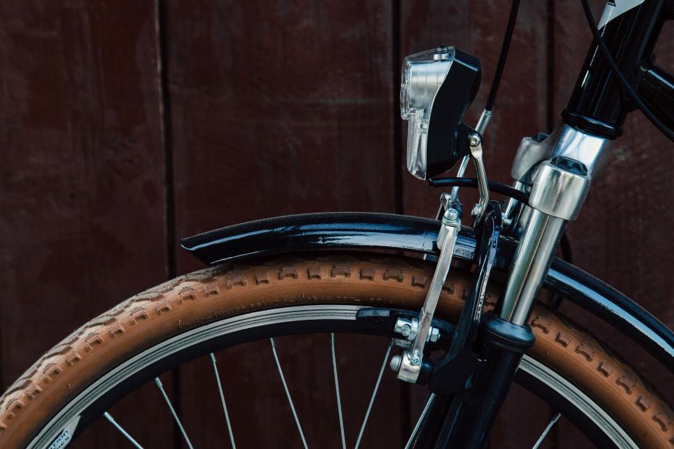 Free Image of Close-up of bicycle wheel and fender 