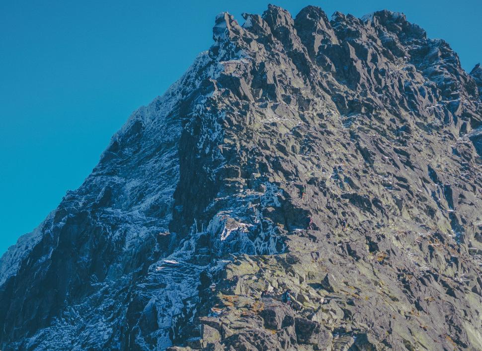 Free Image of Rocky mountain peak with a textured surface 