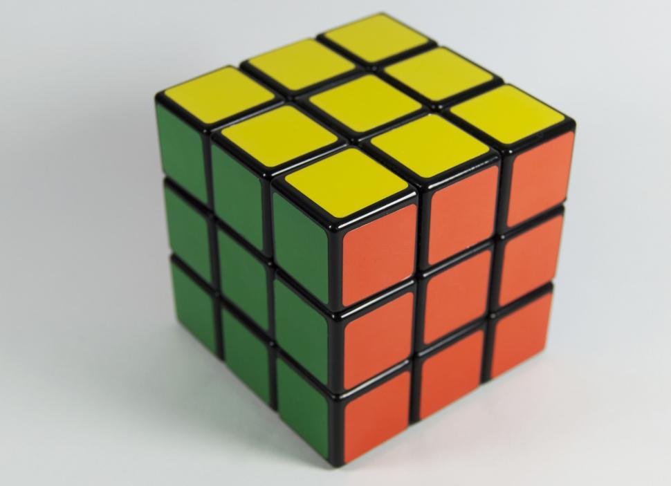 Free Image of Solved colorful Rubik s Cube on white background 