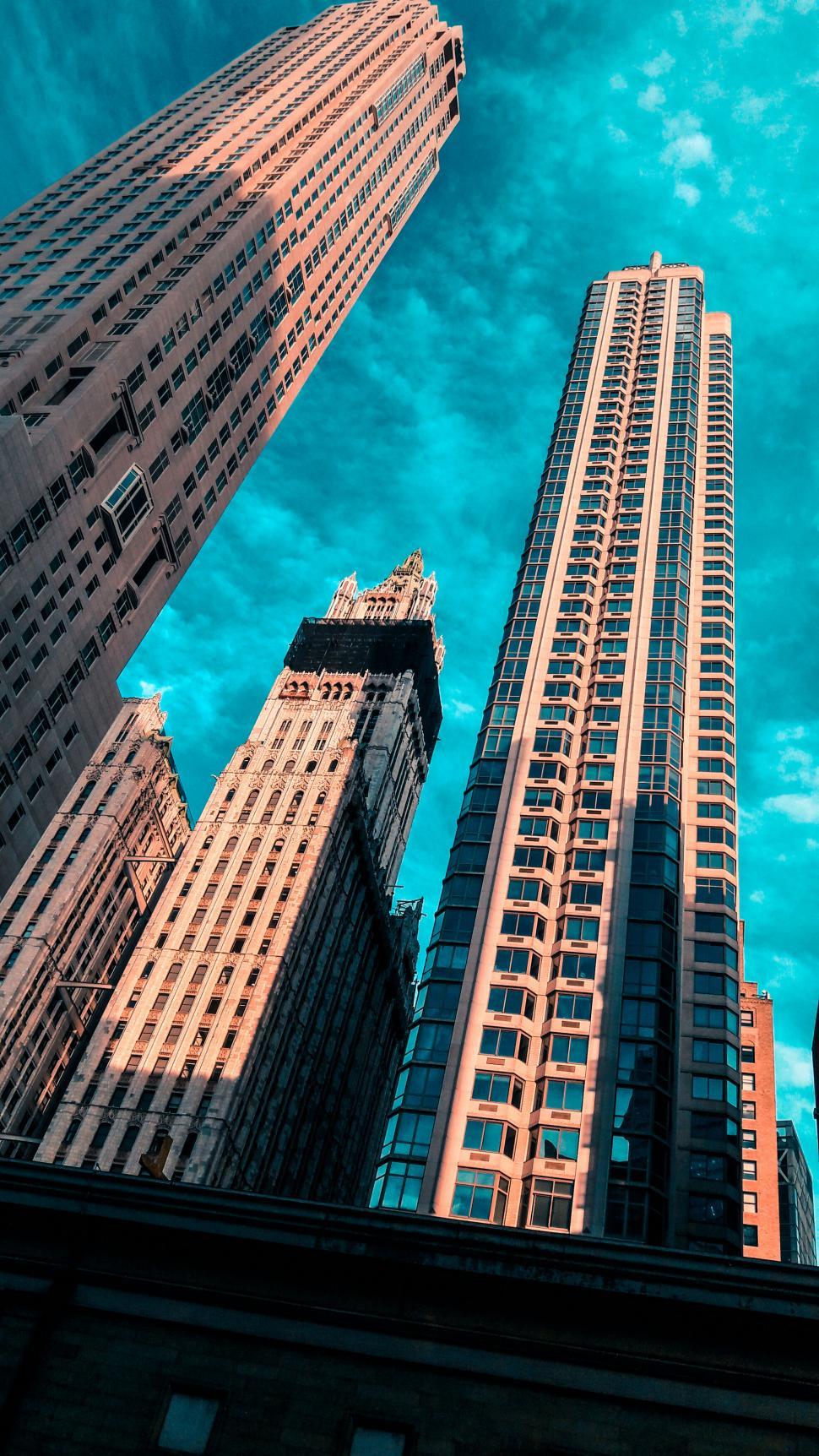 Free Image of Sky-high view of towering skyscrapers against sky 