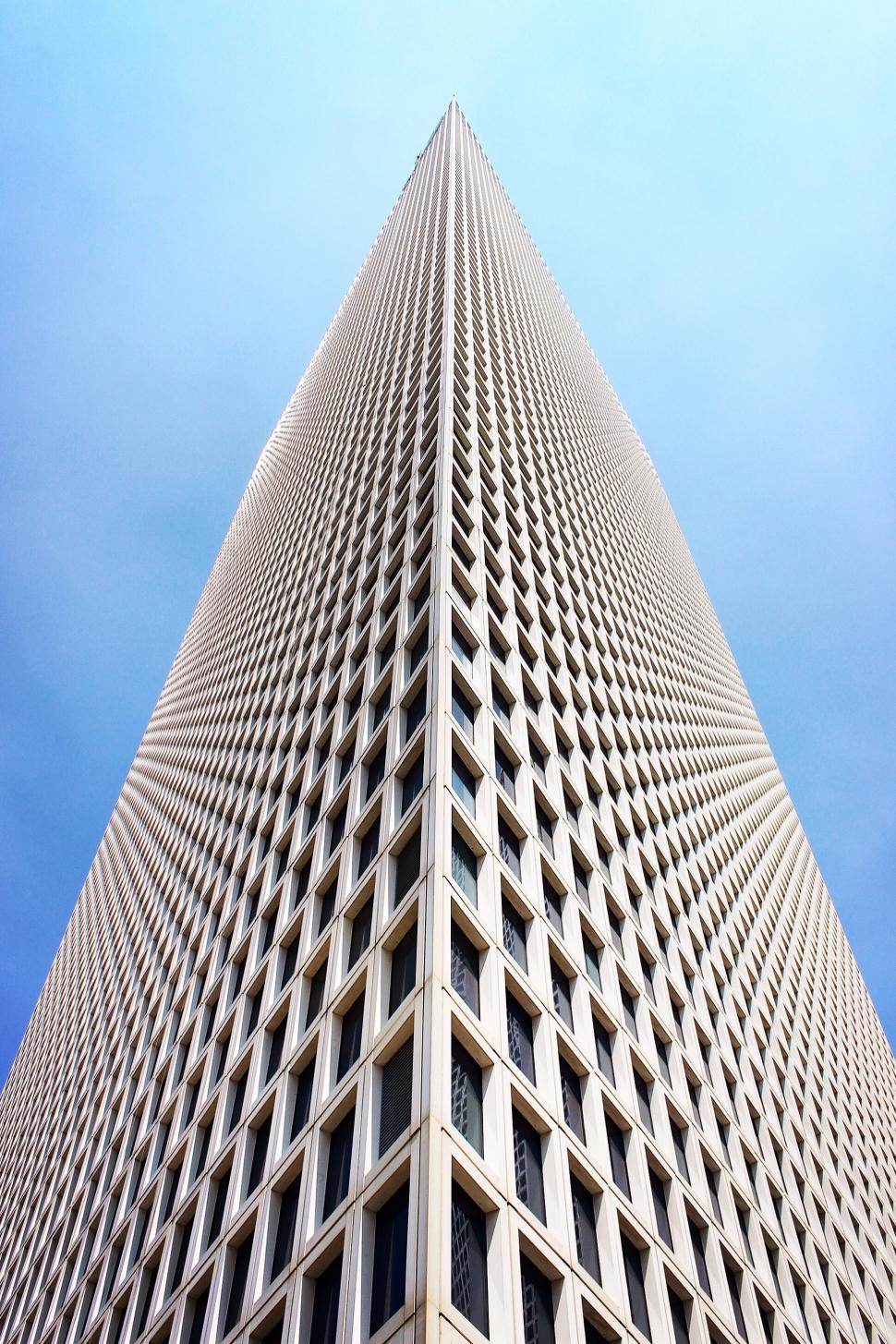 Free Image of Skyscraper with patterned facade against sky 