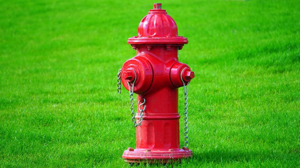 Free Image of Vibrant Red Fire Hydrant on Green Grass 