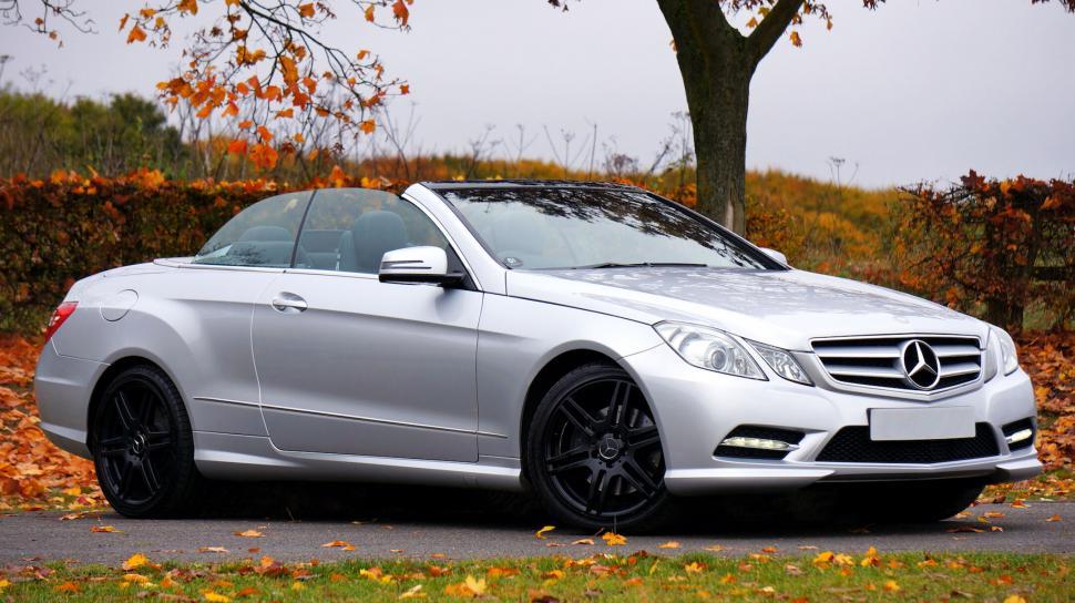 Free Image of Modern silver Mercedes convertible on road 