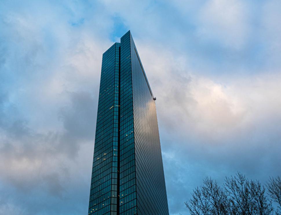 Free Image of Modern skyscraper with a sleek glass facade 