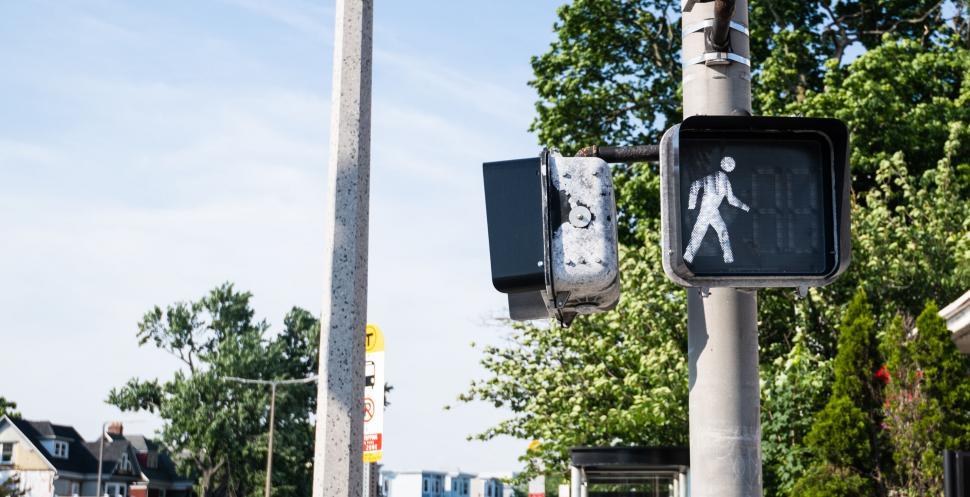 Free Image of Pedestrian crossing signal with graffiti 