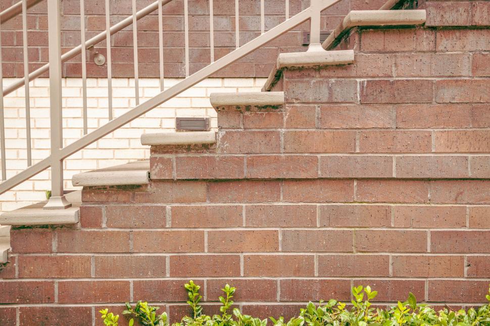 Free Image of Brick staircase with green plants 