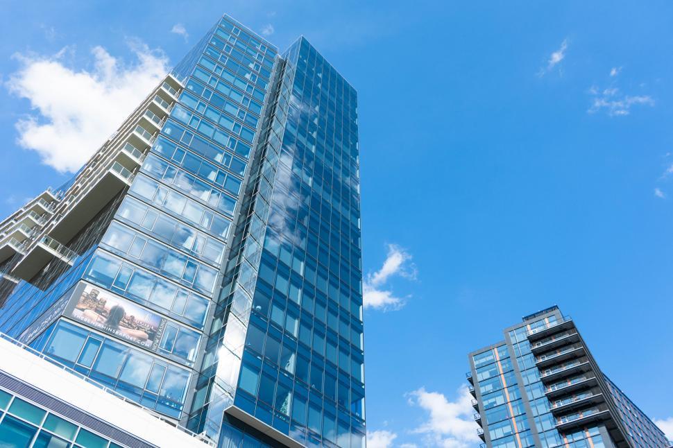 Free Image of Modern glass skyscrapers under blue sky 