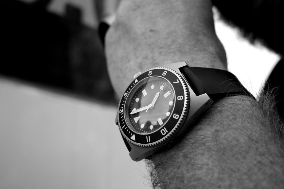 Free Image of Man wearing a classic styled wristwatch 