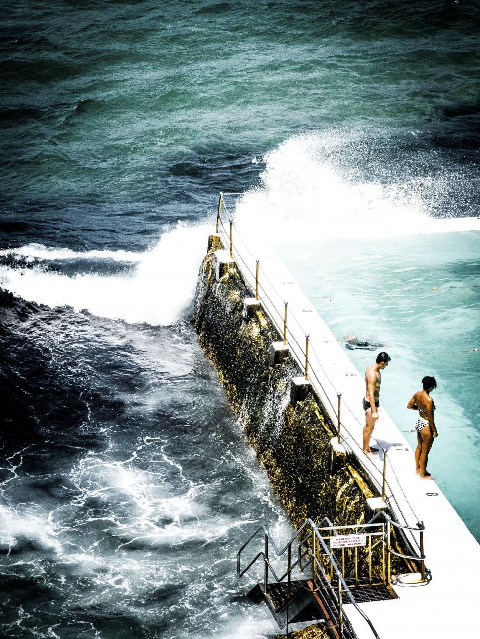 Free Image of Ocean swimming pool with crashing waves 