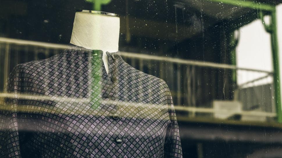 Free Image of Tailor s mannequin wearing a patterned shirt 