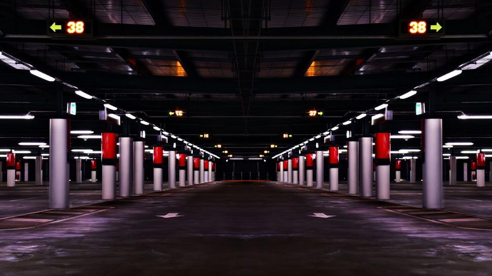 Free Image of Symmetrical empty underground parking lot 