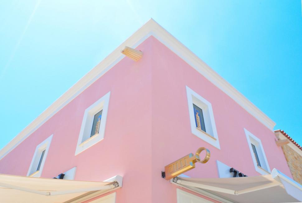 Free Image of Bright pink corner of a Mediterranean building 